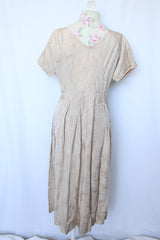 Women's vintage 1960's short sleeve midi length shift dress in oyster off white color