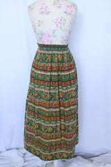 Women 's vintage 1970's cotton lightweight ankle length maxi skirt in all over green and brown abstract print.