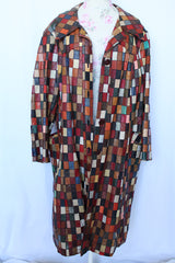 Women's or men's vintage 1970's long sleeve long length leather patchwork jacket with multicolored patchwork squares.