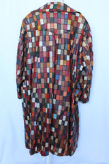 Women's or men's vintage 1970's long sleeve long length leather patchwork jacket with multicolored patchwork squares.