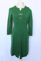 Women's vintage 1960's Dalton label long sleeve knee length green wool dress with a ribbed mid section and gold hardware detail on chest.