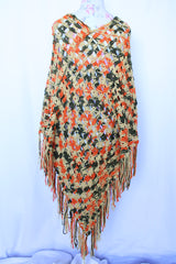 Women's vintage 1970's acrylic knit multicolored poncho with a long fringe trim hem, drawstring at neck, and V shaped neckline in orange, mustard yellow, and olive green colors.