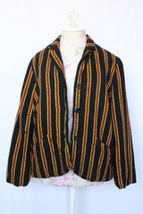 Women's vintage 1960's Sport Whirl label button up wool material blazer in black with yellow and red vertical stripes.