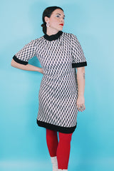 Women's vintage 1970's Mode O'Day, Styled in California label short sleeve mini length dress in black and white polyester material with diamond checkered print.