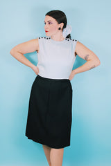 Women's vintage 1960's Richard Frontman label sleeveless twofer knee length sheath dress in cotton blend material. Top half is baby blue and bottom half is black.