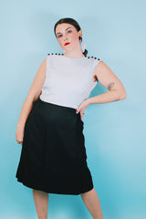 Women's vintage 1960's Richard Frontman label sleeveless twofer knee length sheath dress in cotton blend material. Top half is baby blue and bottom half is black.