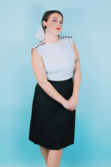 Women's vintage 1960's Richard Frontman label sleeveless twofer knee length sheath dress in cotton blend material. Top half is baby blue and bottom half is black.