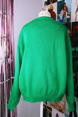 long sleeve kelly green pullover sweater with navy, yellow, and red diamond pattern vintage 1980's
