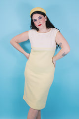 Women's vintage 1970's Jantzen, Made in USA label sleeveless midi length soft acrylic dress in baby yellow with white and yellow stripes across chest.