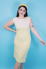 Women's vintage 1970's Jantzen, Made in USA label sleeveless midi length soft acrylic dress in baby yellow with white and yellow stripes across chest.