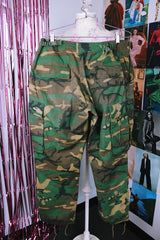 green camo print us military pants with pockets and adjustable waist and ankles vintage