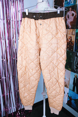 light tan quilted nylon military liner pants with brown trim popper closure vintage 1950's