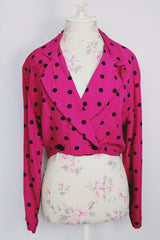Women's vintage 1980's top and capris matching set in magenta with black polka dots. Capris has elastic waistband. Top is cropped with double breasted closure.