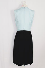 Women's vintage 1960's Richard Frontman label sleeveless twofer knee length sheath dress in cotton blend material. Top half is baby blue and bottom half is black.