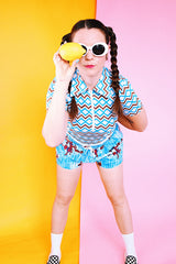 short sleeve zig zag print top with half zip front and collar brown white blue polyester women's vintage 1970's