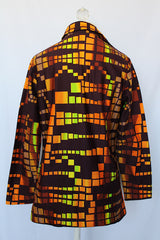 Women's vintage 1970's Styled by Terry, Chicago label long sleeve blouse with half button closure in the front and a rounded collar.