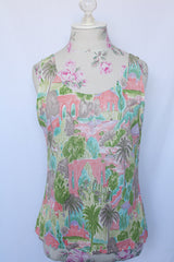 Women's vintage 1970's matching tank top and button up blouse set.