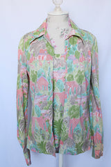 Women's vintage 1970's matching tank top and button up blouse set.