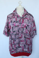 Women's or men's vintage 1980's Alan Stuart short sleeve pullover half button closure shirt with collar and knitted ribbed hem.