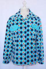 Women's vintage 1970's long sleeve button up corduroy blouse with collar. Blue and navy checkered gingham print with small roses.