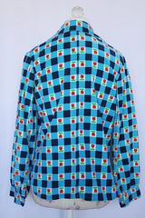 Women's vintage 1970's long sleeve button up corduroy blouse with collar. Blue and navy checkered gingham print with small roses.