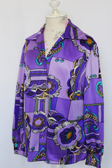 Women's vintage 1970's Pykettes label long sleeve button up blouse with pointy collar in thick polyester material.