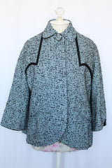 Women's vintage 1940's Bedell, An Original by Solmar - The Finest Name in Fashion label short sleeve wool cropped jacket with one button closure. Has small rounded collar, big clear button, blue colored.