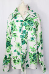 Women's or men's vintage 1970's Triumph of California label long sleeve button up shirt with dagger collar. White polyester with all over green floral print.