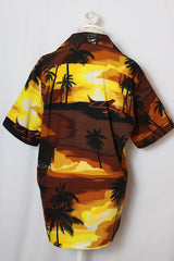 Men's or women's vintage 1970's Kai Nani Hawaii short sleeve button up shirt with double lapel in lightweight polyester in brown and yellow all over Hawaiian print.