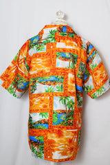 Men's or women's vintage 1970's Mauna Kea label short sleeve button up shirt with double lapel, left chest pocket, and amber buttons in orange all over Hawaiian print.