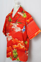 Women's or men's vintage 1970's Made in Hawaii short sleeve red all over Hawaiian print button up shirt.