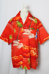 Women's or men's vintage 1970's Made in Hawaii short sleeve red all over Hawaiian print button up shirt.