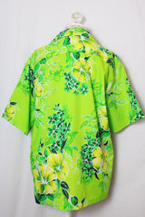 Men's or women's vintage 1970's Reef, Made in Hawaii label shirt sleeve button up shirt in all over bright green Hawaiian print.
