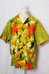 Women's or men's vintage 1970's Sears Hawaii label short sleeve Cotton material all over green Hawaiian print button up shirt with one chest pocket and double lapel.