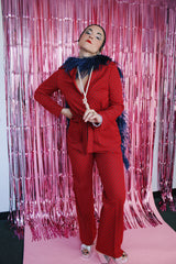 maroon printed long sleeve button up jacket with matching tie belt and matching pants set vintage women's 1970's