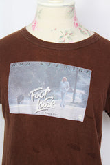 Women's vintage 1977 short sleeve chocolate brown cotton t-shirt with Rod Stewart graphic on the front from album 'Foot Loose & Fancy Free'.