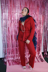 maroon printed long sleeve button up jacket with matching tie belt and matching pants set vintage women's 1970's