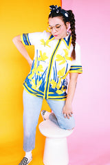 short sleeve zip up blouse with collar white with navy and yellow butterfly print vintage 1970's women's