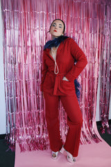 maroon printed long sleeve button up jacket with matching tie belt and matching pants set vintage women's 1970's