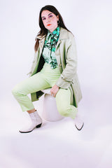 pastel green long sleeve leather jacket buttons up the front and collar 1960's vintage