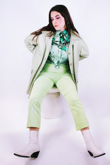 pastel green long sleeve leather jacket buttons up the front and collar 1960's vintage