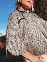 Women's vintage 1940's Bedell, An Original by Solmar - The Finest Name in Fashion label short sleeve wool cropped jacket with one button closure. Has small rounded collar, big clear button, blue colored.