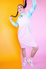 sleeveless knee length light pink with white checkered house dress zips up the front vintage 1970's