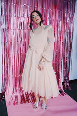 long sleeve midi length tan colored party dress with sheer arms and beads on shoulders vintage 1980's