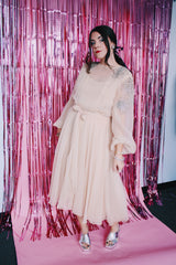 long sleeve midi length tan colored party dress with sheer arms and beads on shoulders vintage 1980's