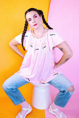 pink capped sleeve cotton blouse with embroidered butterflies throughout vintage 1960's