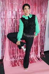 sleeveless black sequined top that buttons on the back cropped fit vintage women's 1960's