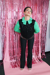 sleeveless black sequined top that buttons on the back cropped fit vintage women's 1960's