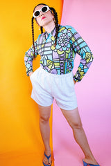 long sleeve purple and blue abstract printed blouse with collar and zipper in the back women's vintage 1960's