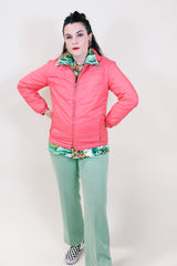 Women's vintage 1970's White Stag USA long sleeve pink colored nylon zip up lightweight windbreaker jacket with two pockets.
